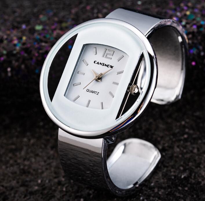 New Luxury Brand Ladies Dress Watch with unique oval dial design and stainless steel bracelet for fashionable elegance.
